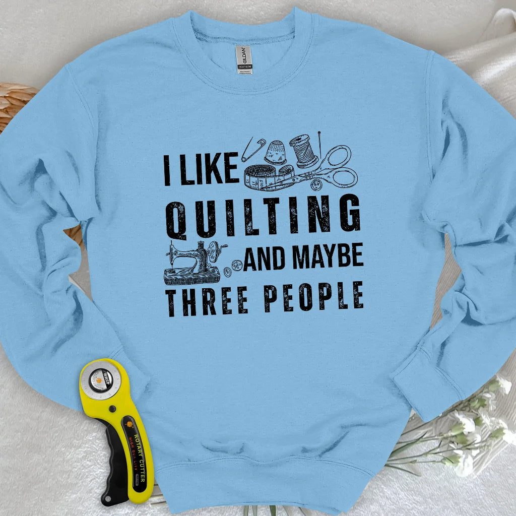 Sweat-shirt matelassé et 3 personnes