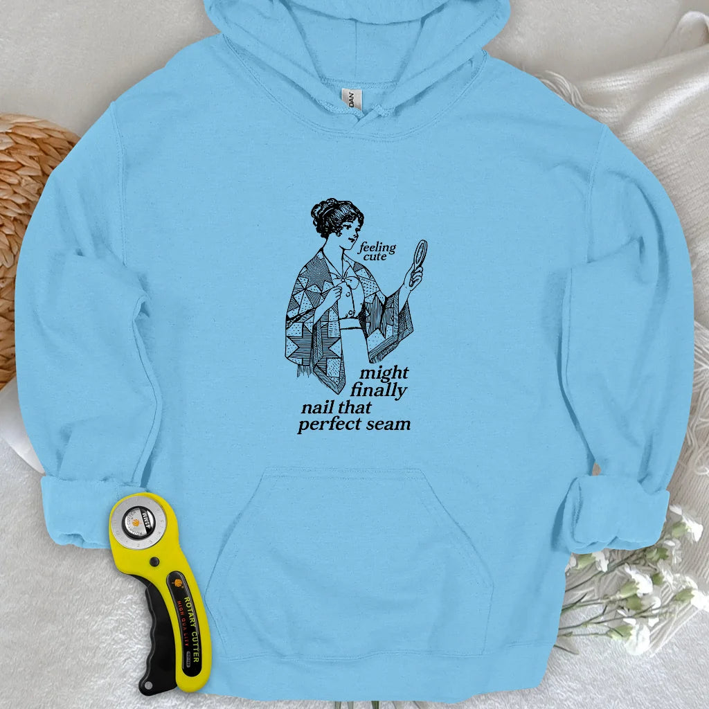 The Seamstress’s Mirror Hoodie