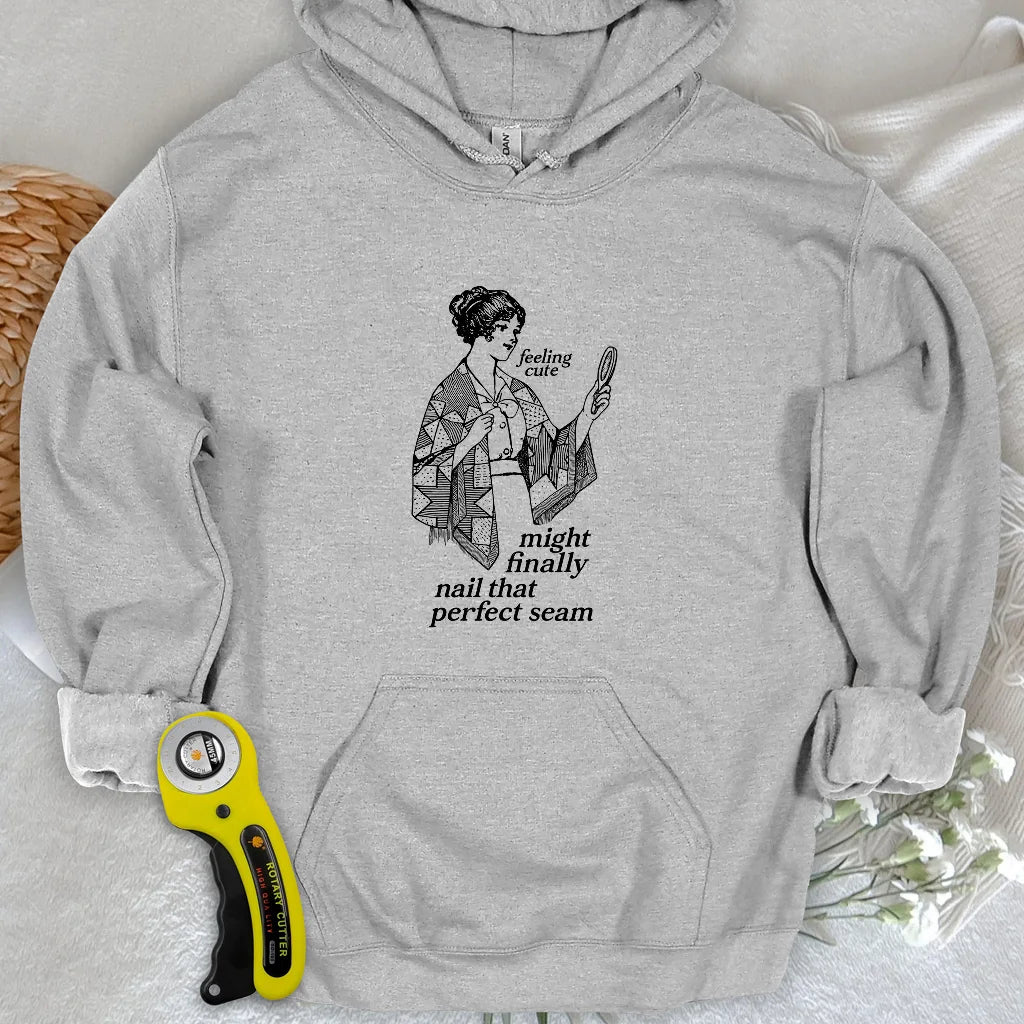 The Seamstress’s Mirror Hoodie