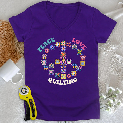 Maglia con scollo a V da donna «Il quilting porta pace»