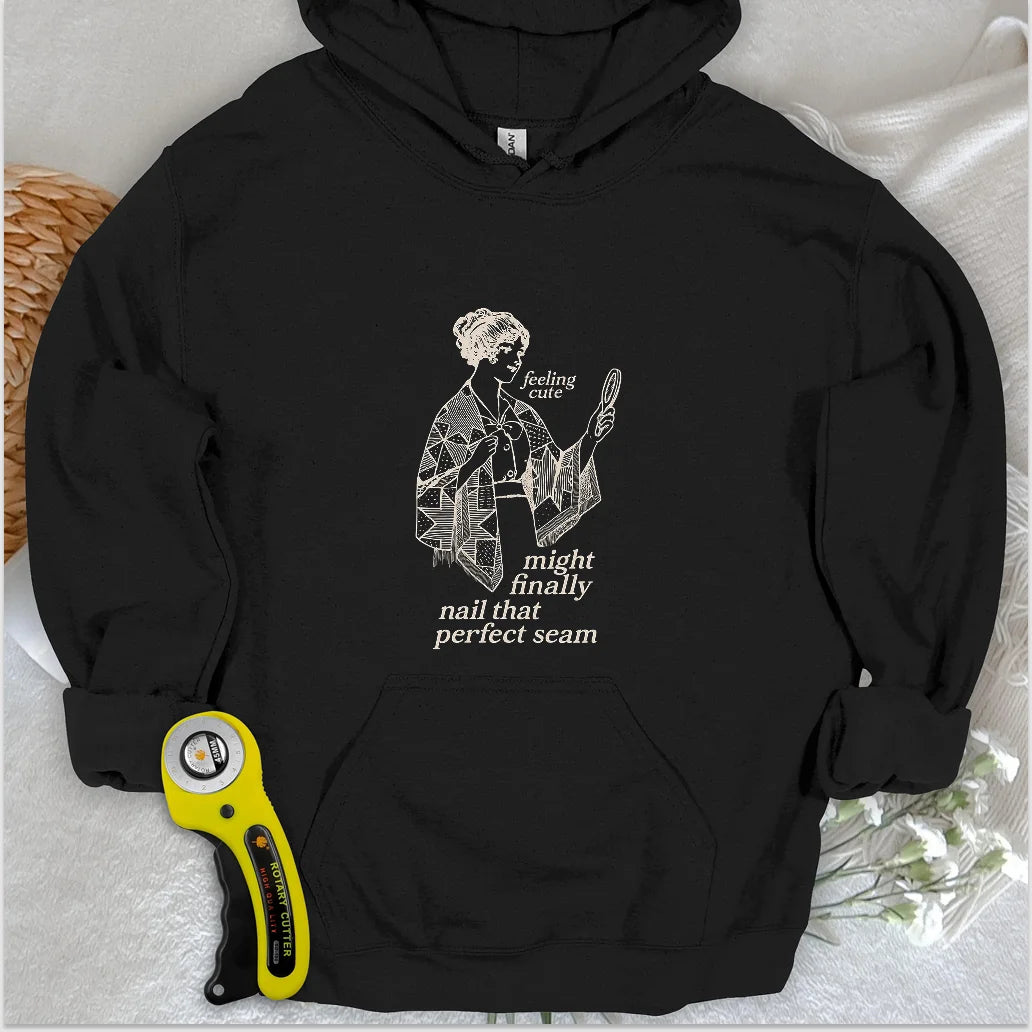The Seamstress’s Mirror Hoodie