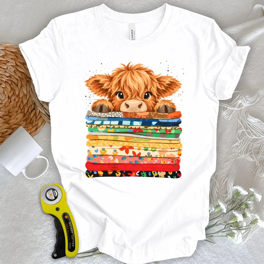 Highland Cow on a Fabric Stack T-shirt