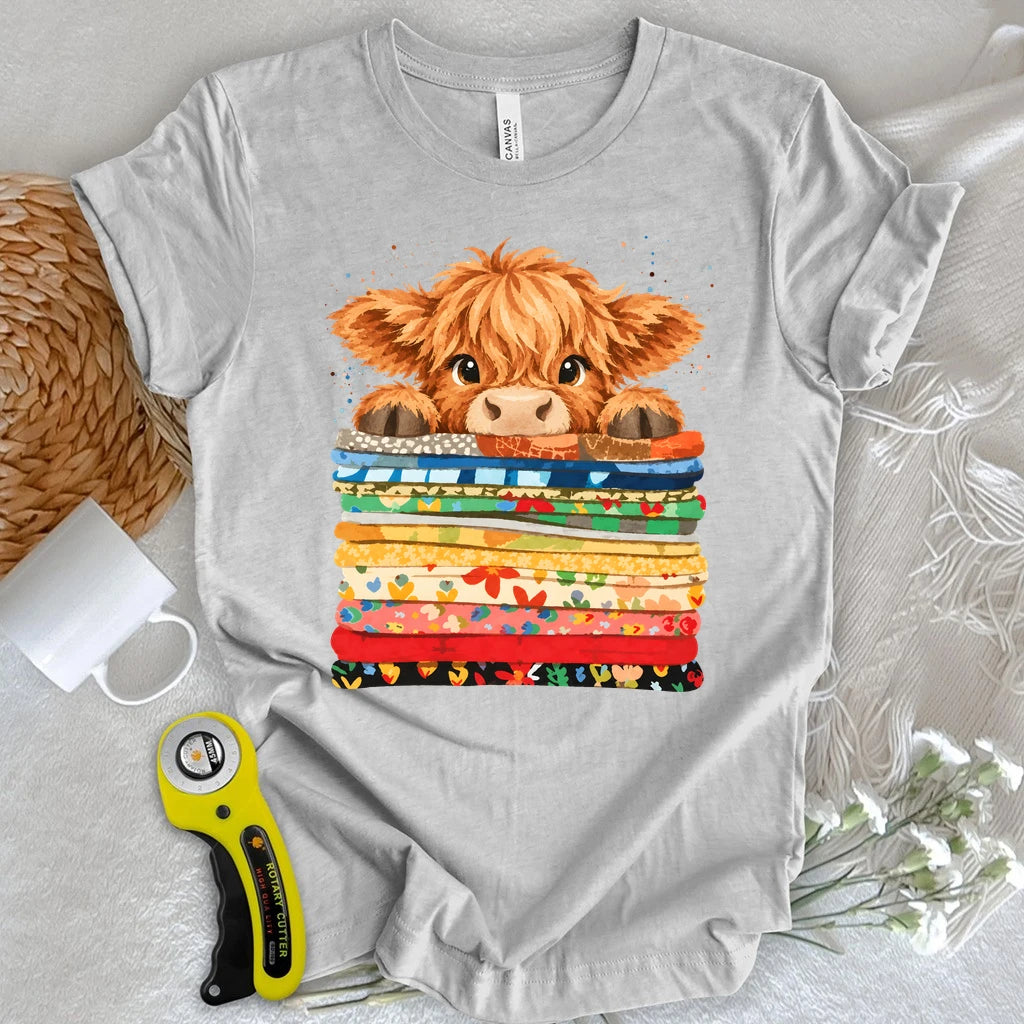 Highland Cow on a Fabric Stack T-shirt