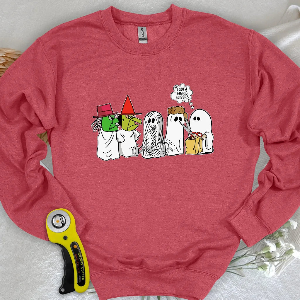 J'ai un pull molletonné ciseaux en tissu.