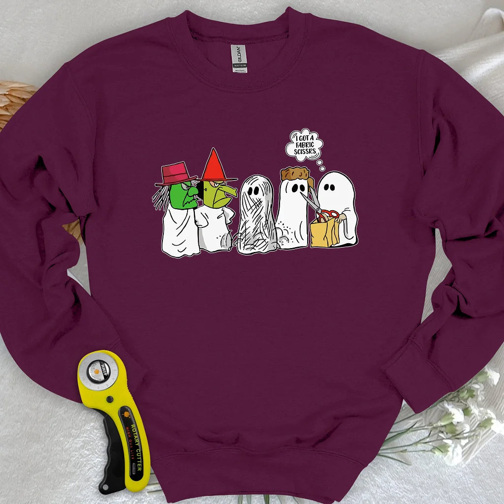 J'ai un pull molletonné ciseaux en tissu.