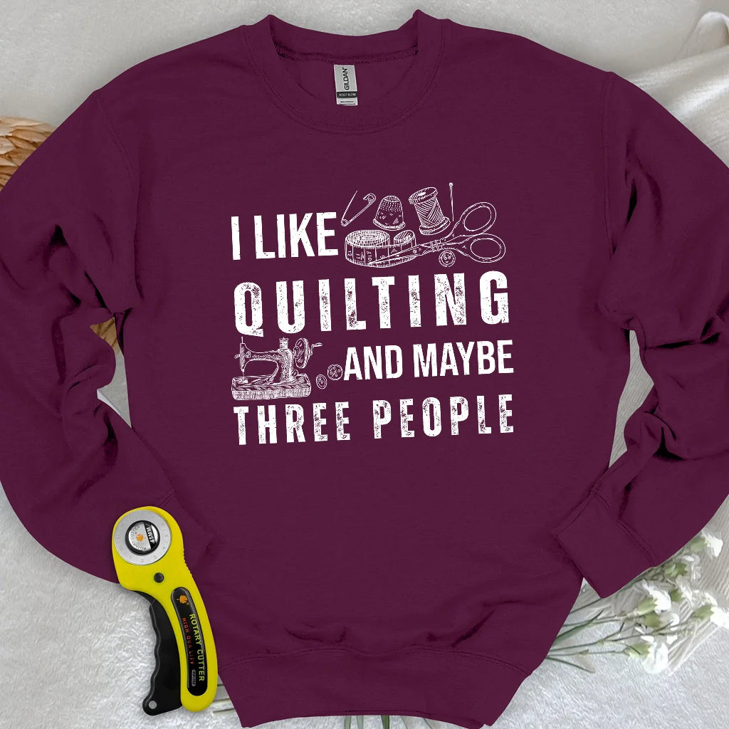 Sweat-shirt matelassé et 3 personnes