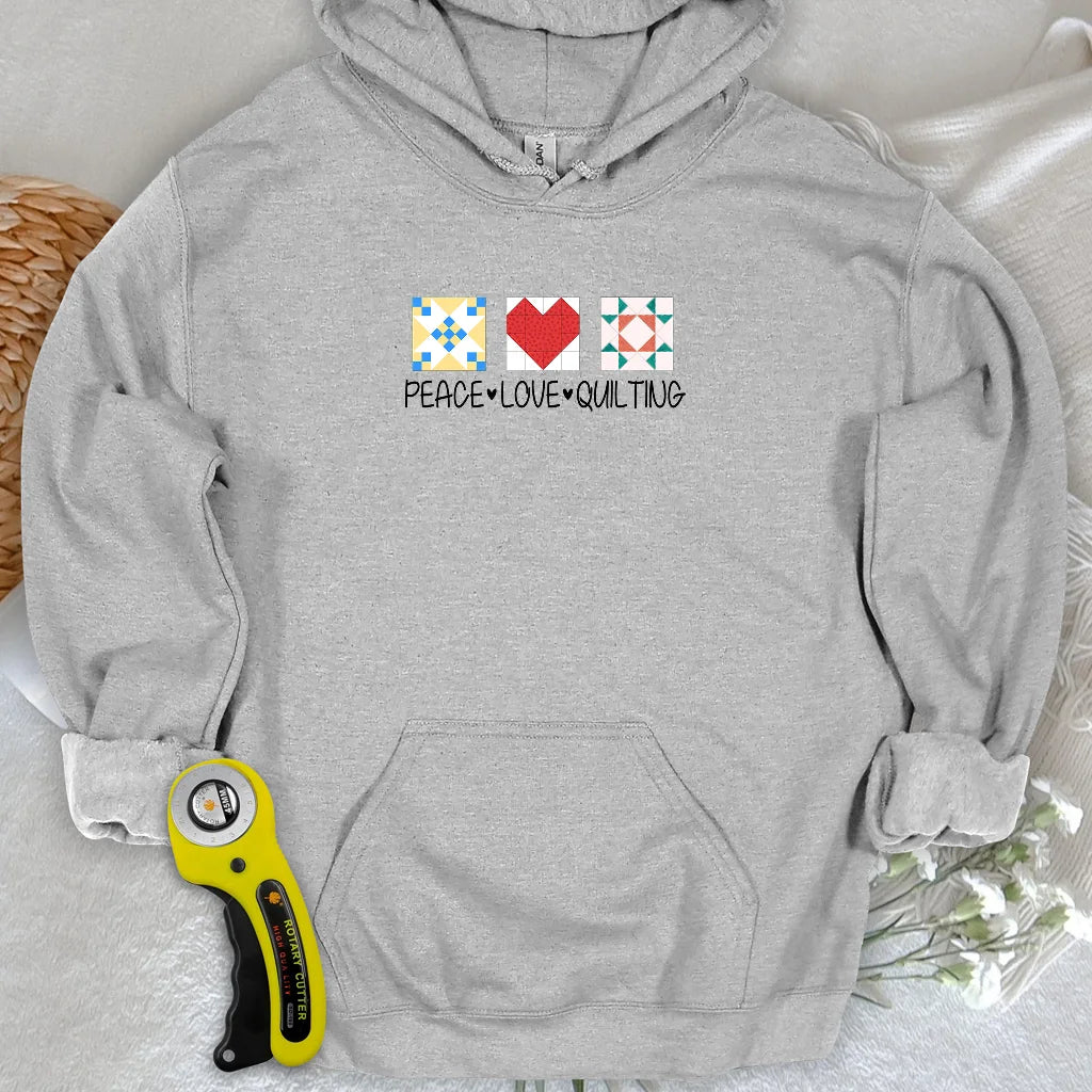 Sweat à capuche « Paix Amour Courtepointe »