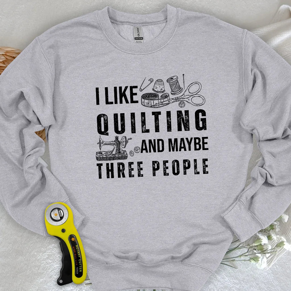 Sweat-shirt matelassé et 3 personnes