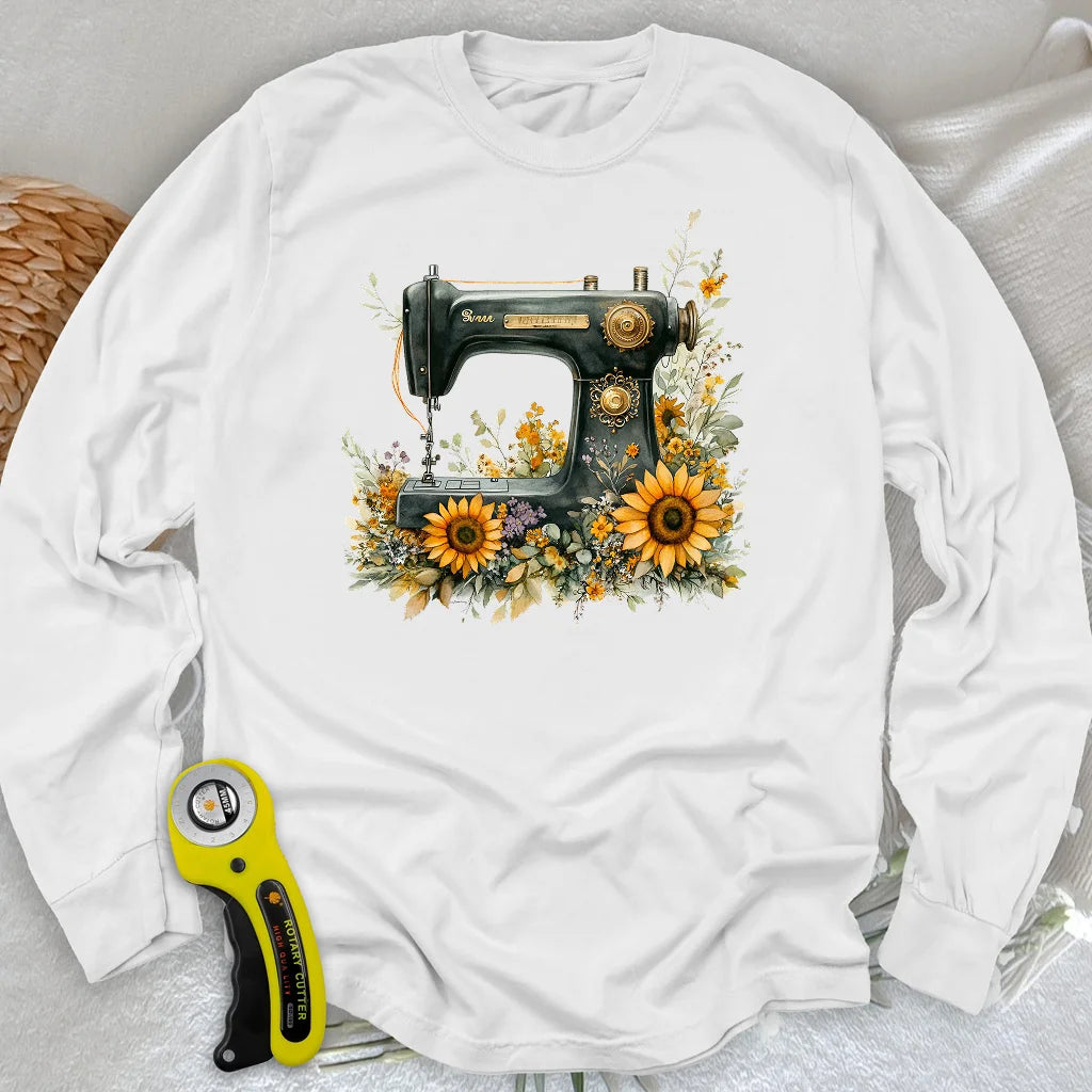 T-shirt à manches longues motif machine à coudre fleurie