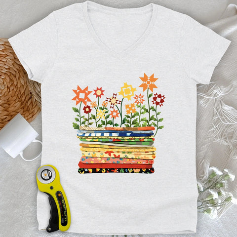 Maglia con scollo a V Dove fioriscono le trapunte
